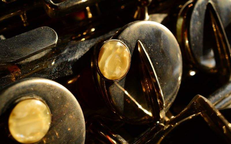 Saxophone buttons close-up digital marketing section services