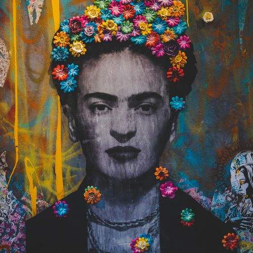 Creative graffiti wall with portrait of Frida Kahlo