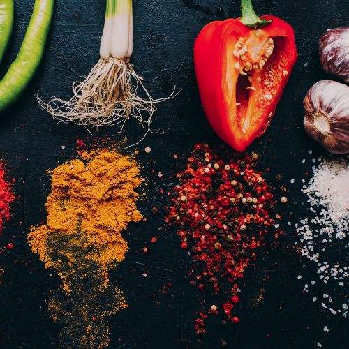 Culinary art of food ingredients and seasonings garlic green onion red pepper