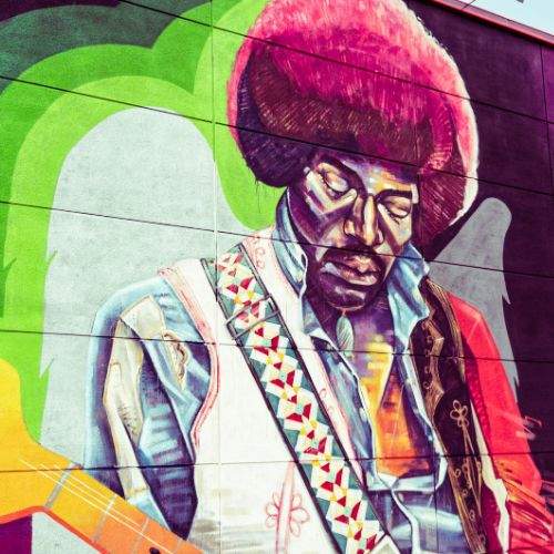 Street paint of Jimi Hendrix wall art at Guitar Center